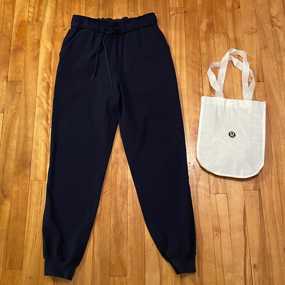 lululemon athletica Pants - Lululemon On The Fly pants with tote shopping bag